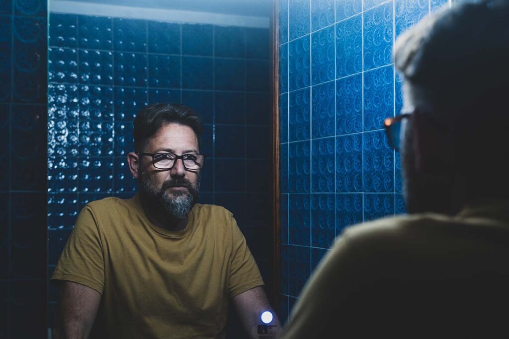 Man thinking about meth effects on teeth