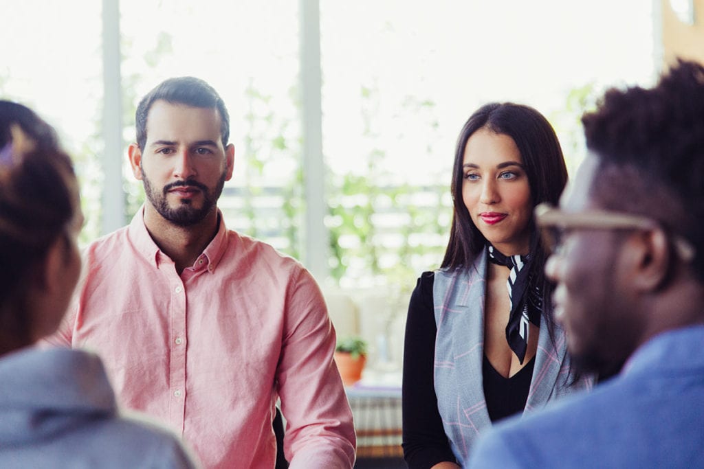 individuals in group therapy learning What Are Co-Occurring Disorders