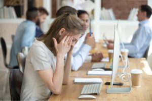 Woman experiencing anxiety at work