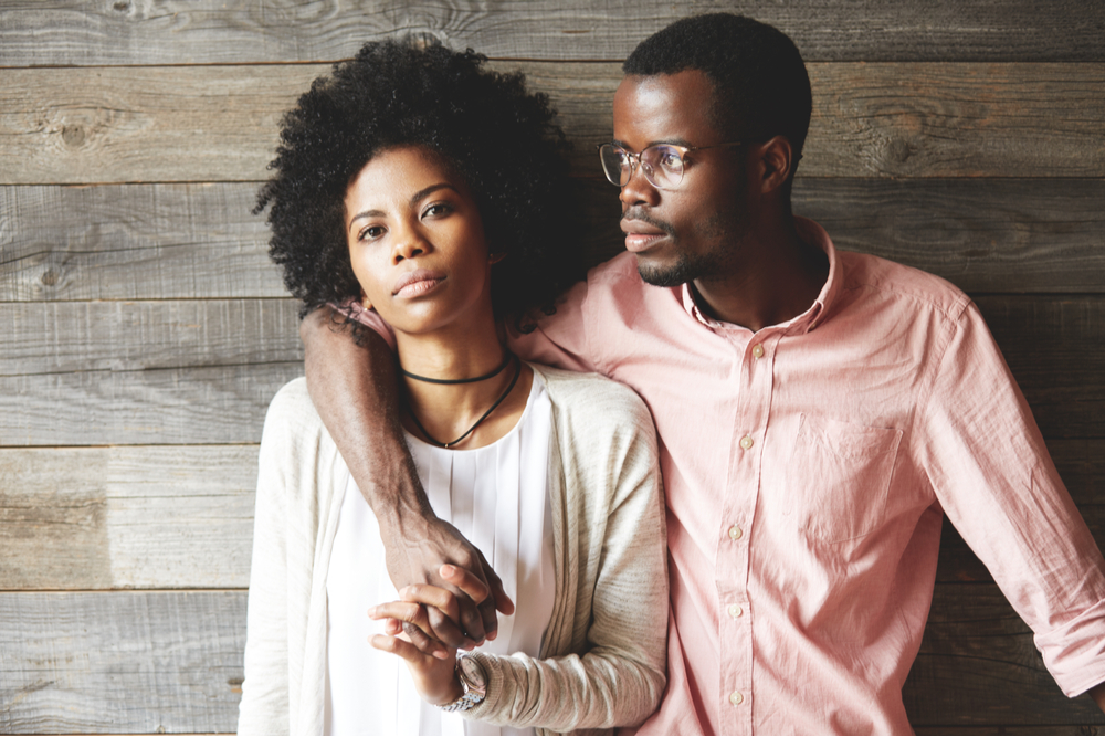 Man holding woman representing different attachment styles