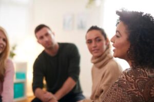 People sitting together at an aftercare program