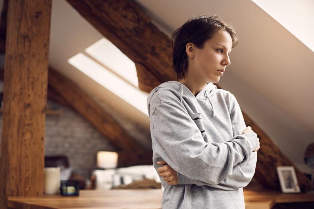 Person with crossed arms, thinking about what the types of drinkers are