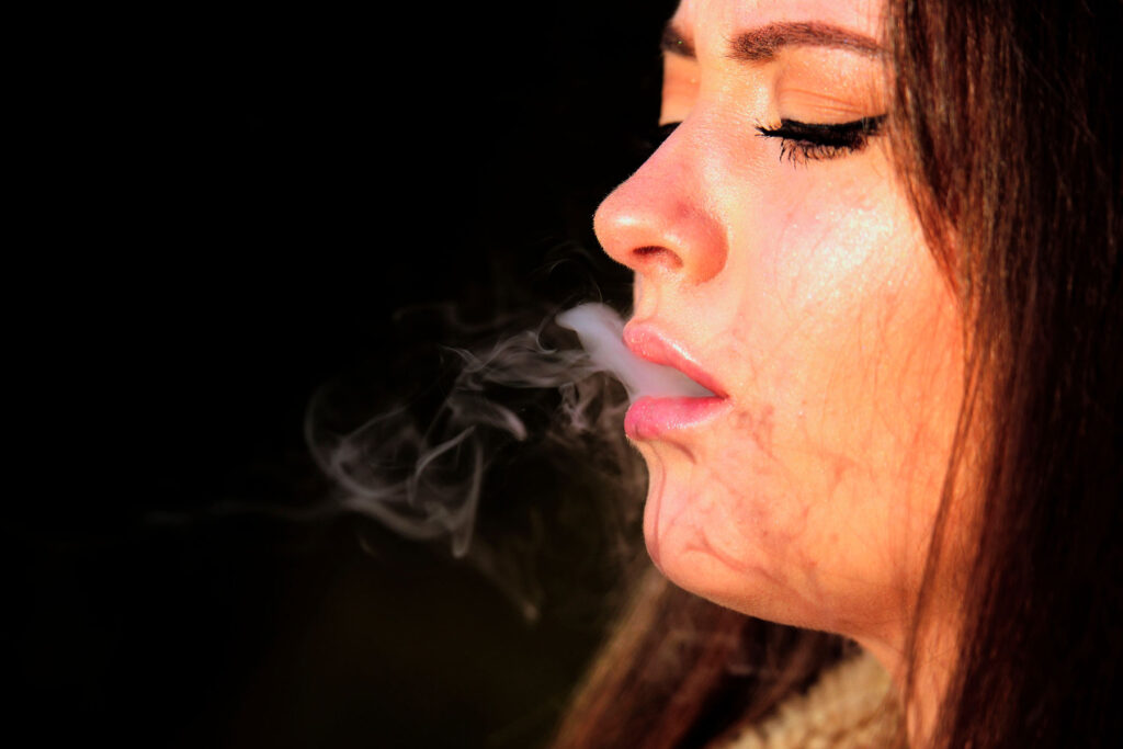Person using marijuana and feeling anxiety