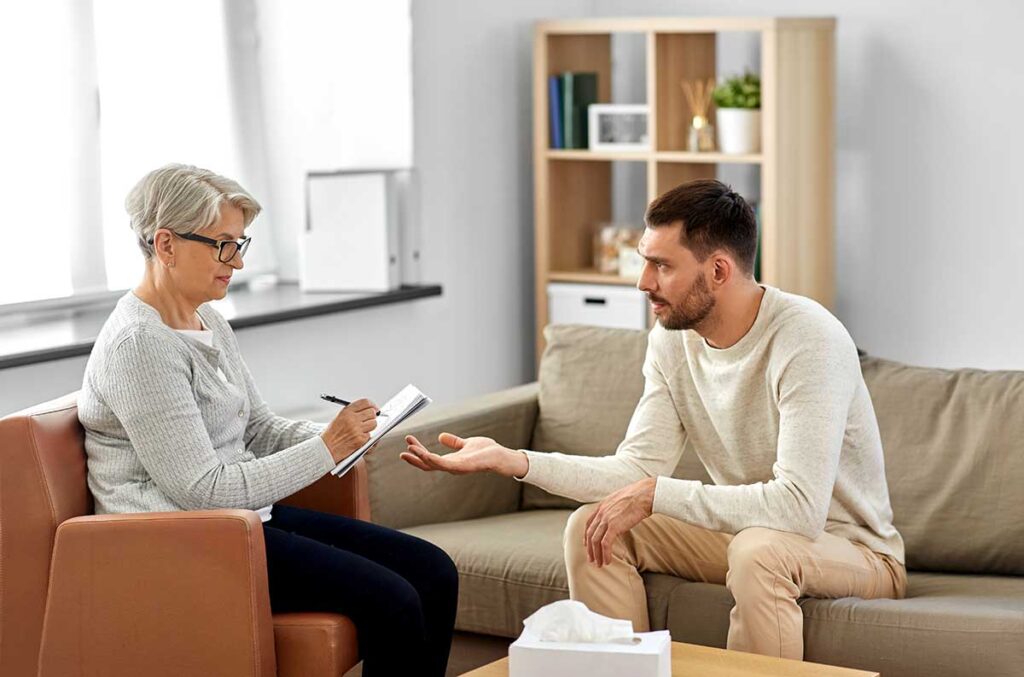 Person learning what to expect in rehab from their therapist
