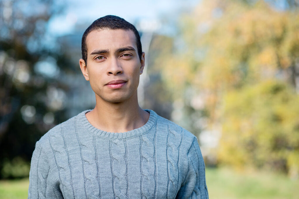 Person struggling with depression and drug abuse